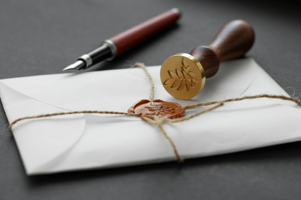 Notary Public Wax Stamper. White Envelope With Brown Wax Seal, Golden Stamp. Responsive Design